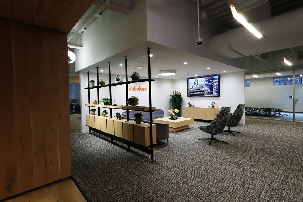 The reception area is a hub to public meeting rooms, the boardroom, and the management team.